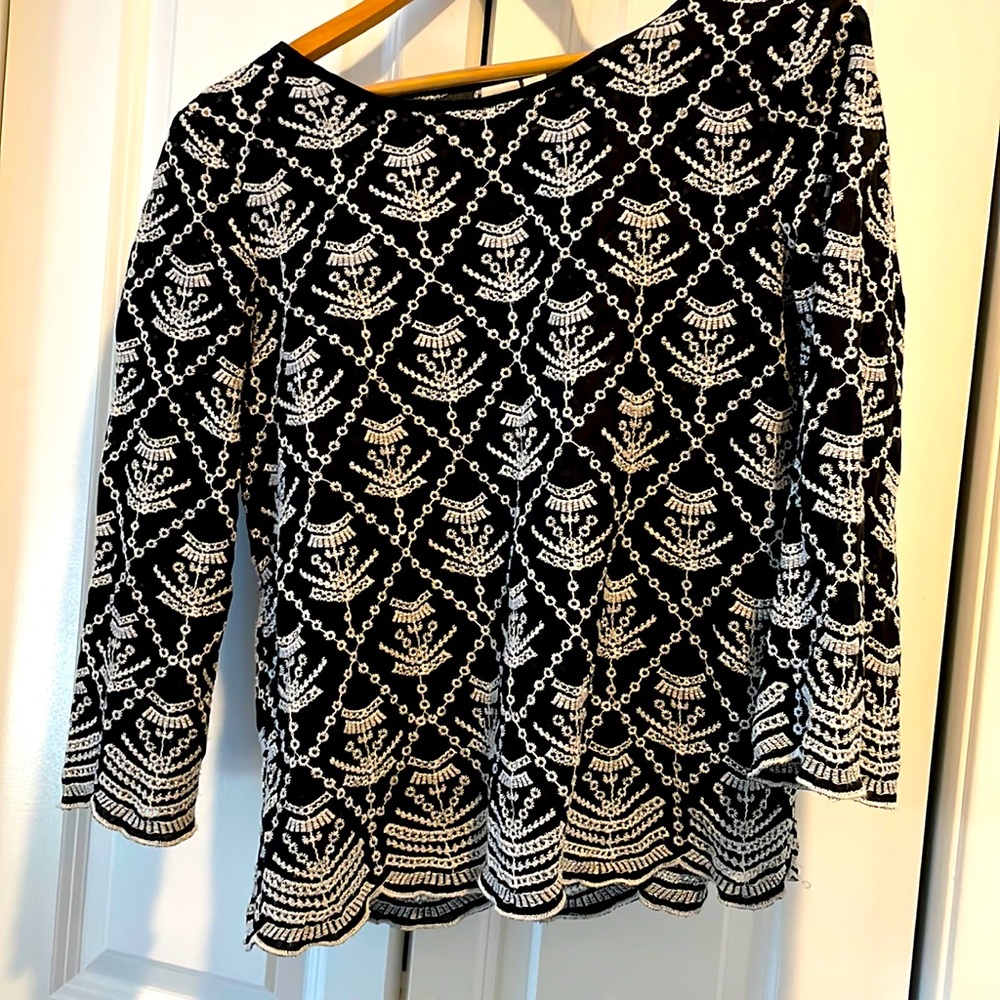 Black and white eyelet top.